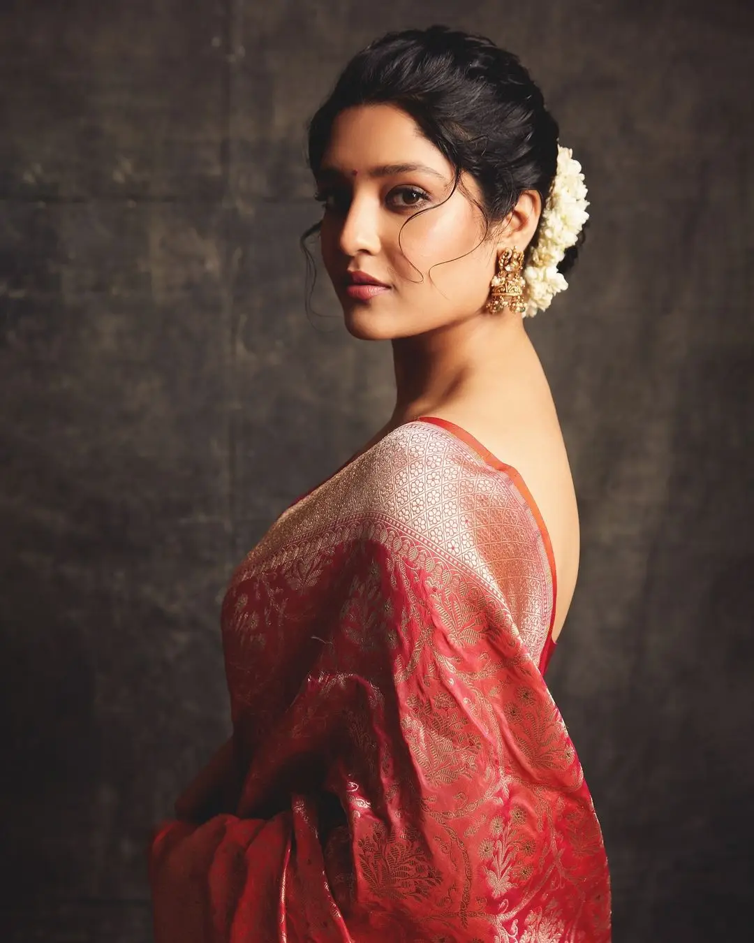 Ritika Singh Wearing Beautiful Earrings Red Saree Sleeveless Blouse